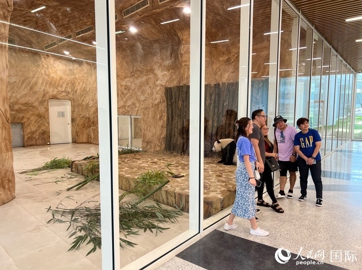 當(dāng)?shù)赜慰团c“四?！焙嫌?。人民網(wǎng)記者 張志文攝