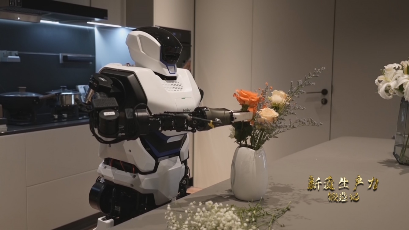人形機(jī)器人插花。