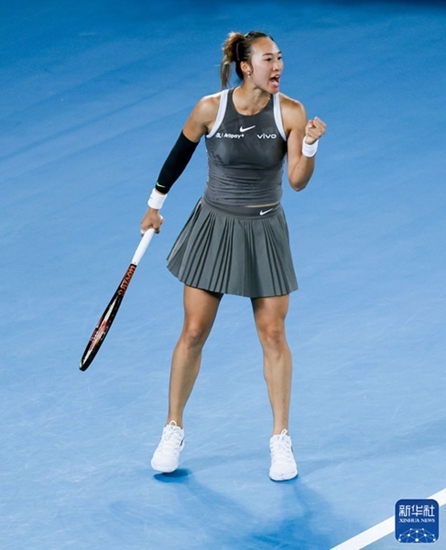 鄭欽文在比賽中慶祝得分。新華社記者 馬平 攝